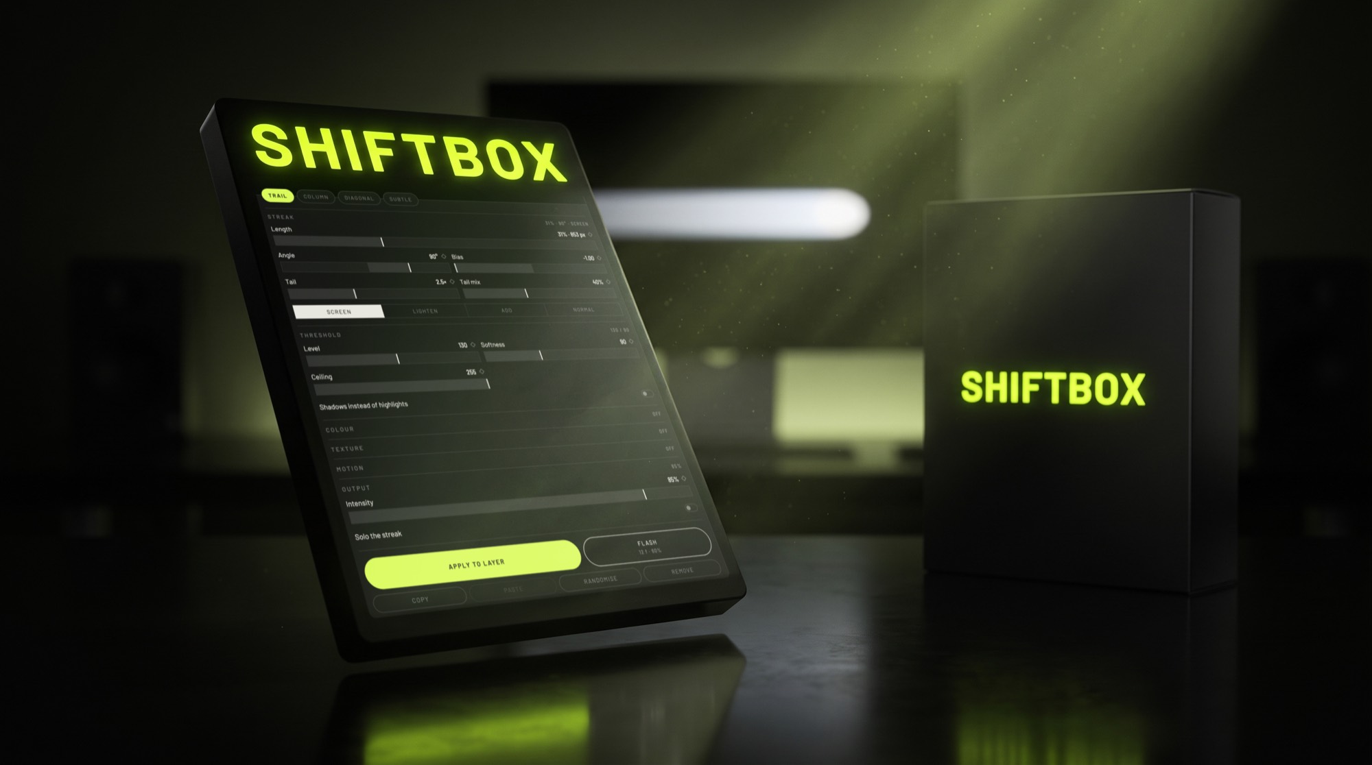 The ShiftBox panel tilted on a dark desk, its box behind